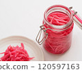 Red pickled ginger in a storage jar 120597163