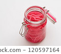 Red pickled ginger in a storage jar 120597164