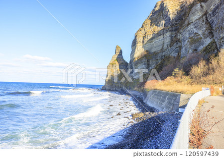 The coastline with Setakamui Rocks, a spectacular view of Furubira Town, Hokkaido 120597439