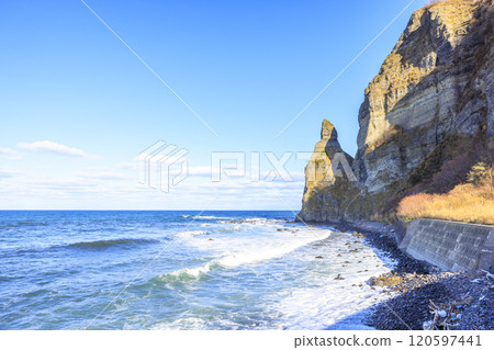 The coastline with Setakamui Rocks, a spectacular view of Furubira Town, Hokkaido 120597441