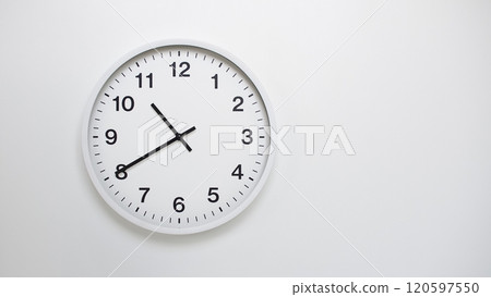 Clean White Clock at 10.40 or 22.40 on Minimalist White Background - Ideal for Time Concepts and Modern Design Clean White Clock at 10.40 or 22.40 on Minimalist White Background - Ideal for Time Concepts and Modern Design 120597550