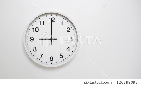 Clean White Clock at 09.00 or 21.00 on Minimalist White Background - Ideal for Time Concepts and Modern Design Clean White Clock at 09.00 or 21.00 on Minimalist White Background - Ideal for Time Concepts and Modern Design 120598095