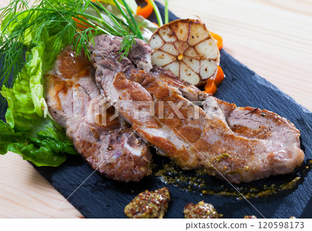 Fried pork with garlic, bell pepper, greens, dijon mustard Fried pork with garlic, bell pepper, greens, dijon mustard 120598173