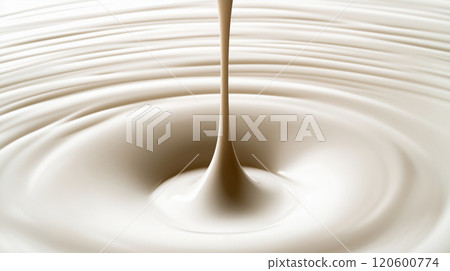 "Pouring a creamy white liquid." 120600774