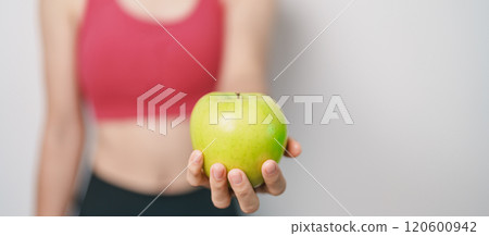woman hand hold green Apple, happy female fitness choose fruit is Healthy food. Dieting control, Weight loss, Obesity, eating lifestyle and nutrition concepts woman hand hold green Apple, happy female fitness choose fruit is Healthy food. Dieting control, Weight loss, Obesity, eating lifestyle and nutrition concepts 120600942