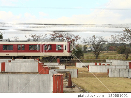 A train on the Kintetsu Nara Line running through the World Heritage Site of Heijo Palace A train on the Kintetsu Nara Line running through the World Heritage Site of Heijo Palace 120601091