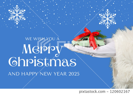 Merry Christmas and happy New Year, car figurine in a hand in a white glove on a blue background with text 120602167