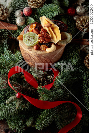 Dried fruits and Christmas wreath. 120602260