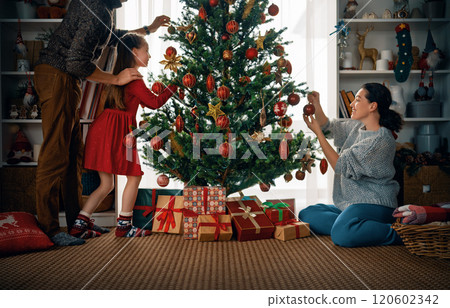 family celebrating Christmas family celebrating Christmas 120602342