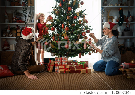 family celebrating Christmas family celebrating Christmas 120602343