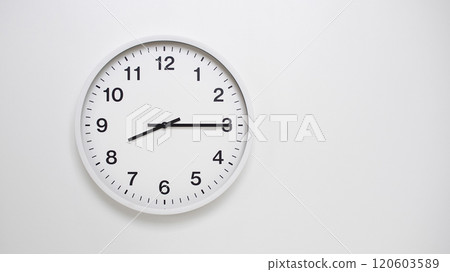 Clean White Clock at 08:15 on Minimalist White Background - Ideal for Time Concepts and Modern Design 120603589