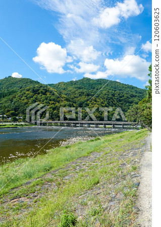 Togetsu Bridge over the Katsura River separating Sagano and Arashiyama (Kyoto City) Togetsu Bridge over the Katsura River separating Sagano and Arashiyama (Kyoto City) 120603625