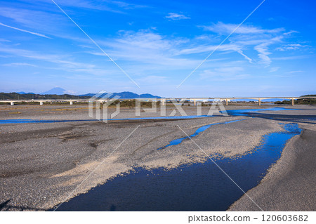 The longest wooden bridge in the world, Horai Bridge, over the Oi River in Shimada City, Shizuoka Prefecture. The Oi River and Mt. Fuji flowing down the bridge. The longest wooden bridge in the world, Horai Bridge, over the Oi River in Shimada City, Shizuoka Prefecture. The Oi River and Mt. Fuji flowing down the bridge. 120603682
