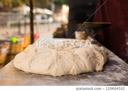 Yeast dough on baking table. cooking process Yeast dough on baking table. cooking process 120604501