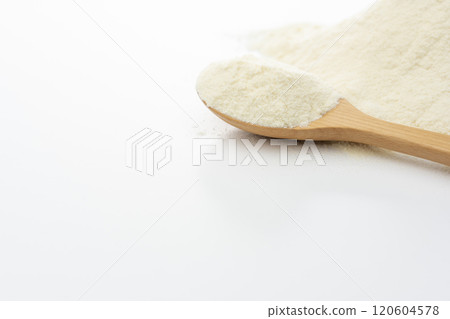 Protein powder in wooden spoon on white background with copy space Protein powder in wooden spoon on white background with copy space 120604578