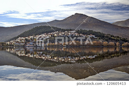 Kastoria town reflected on the waters of Orestiada lake, Western Macedonia, Greece Kastoria town reflected on the waters of Orestiada lake, Western Macedonia, Greece 120605413