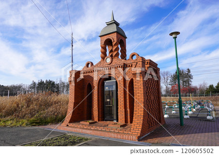 Brick telephone booth in front of Toyohoro Station 120605502