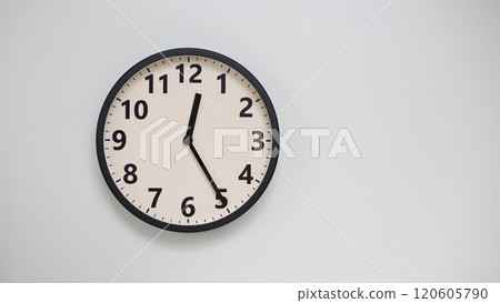 Classic Black-Edged Clock on White Background at 12.25/00.25 - Perfect for Time Management and Text Space 120605790