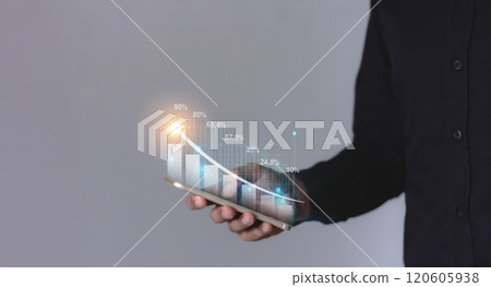 Young man hand using smartphone to visualize money growth The phone screen displays graphs  120605938