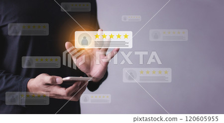 Young Man with smartphone mobile hand touch five star to review and give 5 stars Young Man with smartphone mobile hand touch five star to review and give 5 stars 120605955