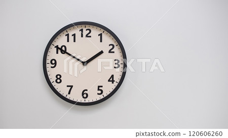 Classic Black-Edged Clock on White Background at 13.50/01.50 - Perfect for Time Management and Text Space 120606260