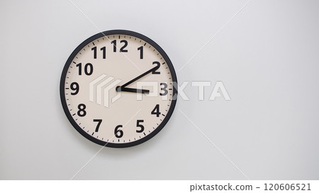 Classic Black-Edged Clock on White Background at 15.10/03.10 - Perfect for Time Management and Text Space 120606521