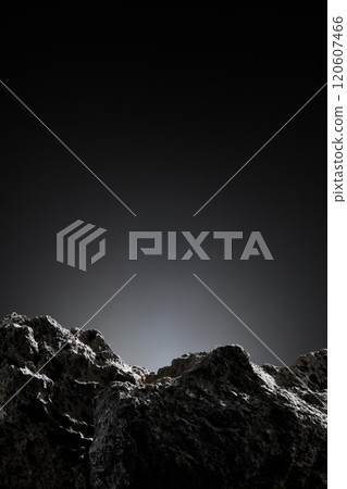 An empty space to display a product in the center of some rough stone block. A dark background creates a luxurious mood, perfect for advertising photo templates. An empty space to display a product in the center of some rough stone block. A dark background creates a luxurious mood, perfect for advertising photo templates. 120607466