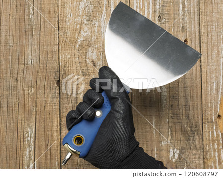 Stainless Steel Trowel with a Black Handle specifically designed for Home Improvement tasks 120608797