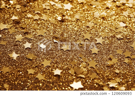 Shimmering gold glitter and star confetti. Shimmering gold glitter and star confetti. 120609093