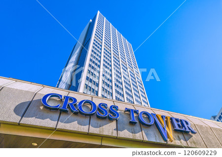 Tokyo cityscape in Japan: A city with a pedestrian bridge. View of Shibuya Cross Tower and other landmarks. Connected to Shibuya Akshu by a pedestrian bridge = 25th 120609229