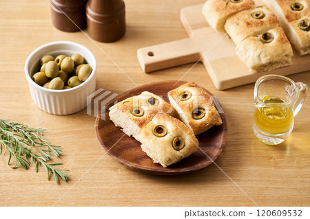 Focaccia baked with olives and rosemary 120609532