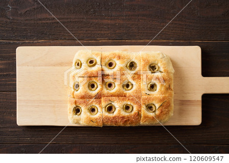 Focaccia baked with olives and rosemary 120609547