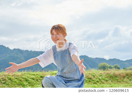 Nursery teachers playing in the park, countryside 120609615