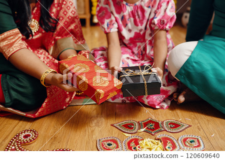 Exchanging Gifts During Vibrant Cultural Celebration Exchanging Gifts During Vibrant Cultural Celebration 120609640