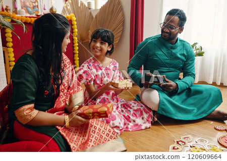 Celebrating Festivities with Family and Exchanging Gifts Celebrating Festivities with Family and Exchanging Gifts 120609664