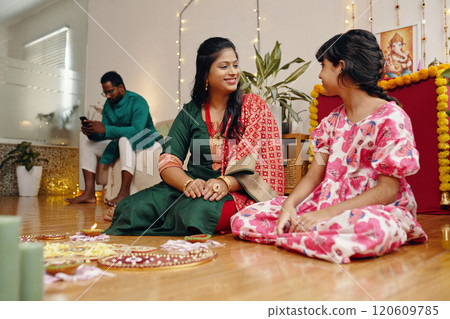 Celebrating Festive Occasion with Family Members at Home 120609785