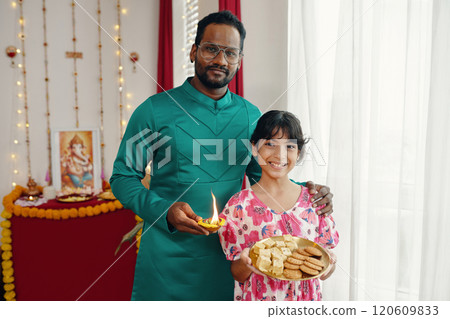 Celebrating Traditional Festival with Family Member 120609833