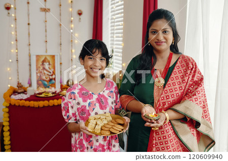 Celebrating Traditional Festival with Family Smiling 120609940