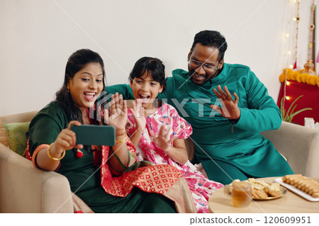 Celebrating Family Moments with Smartphone During Festivities 120609951