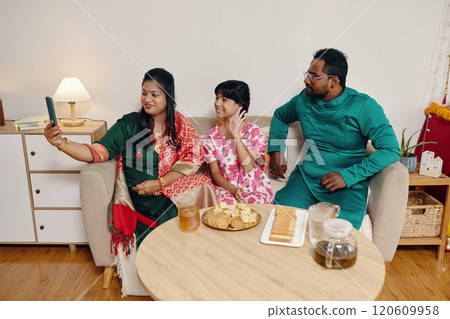 Taking Selfie in Cozy Living Room Setting Taking Selfie in Cozy Living Room Setting 120609958