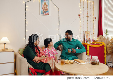 Celebrating Cultural Tradition With Family in Festive Setting 120609969