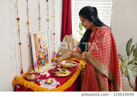 Celebrating Indian Festival with Traditional Decor and Food 120610049