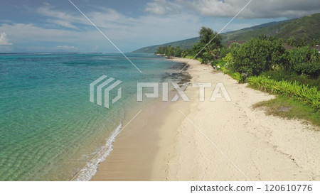 Stunning beauty of Tahiti island coast, turquoise water, sand beach, mountain landscape create a tropical scene. Remote wild nature paradise, exotic summer travel, vacation,holiday relax. Static shot 120610776