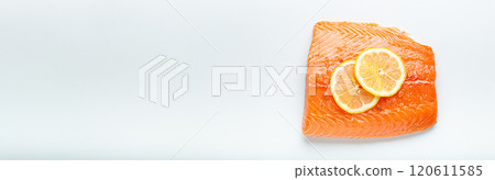 Fresh raw salmon marbled fillet isolated on white background with lemon and coarse salt, top view. Healthy nutrition and diet 120611585
