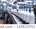 Selective focus of A robot arm in a dairy factory is picking up a stack of white glass bottles filled with fresh pasteurized milk. 120613351
