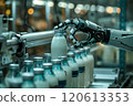Selective focus of A robot arm in a dairy factory is picking up a stack of white glass bottles filled with fresh pasteurized milk. 120613353