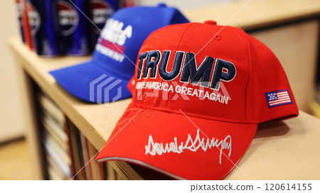 Kyiv, Ukraine - November 5, 2024: hats featuring "Kamala Harris 2024 For President" in blue and "Trump Make America Great Again" in red Kyiv, Ukraine - November 5, 2024: hats featuring "Kamala Harris 2024 For President" in blue and "Trump Make America Great Again" in red 120614155