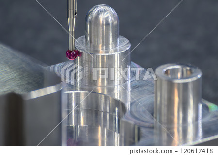 Close up scene the CMM probe measuring the  aluminum automotive parts. 120617418