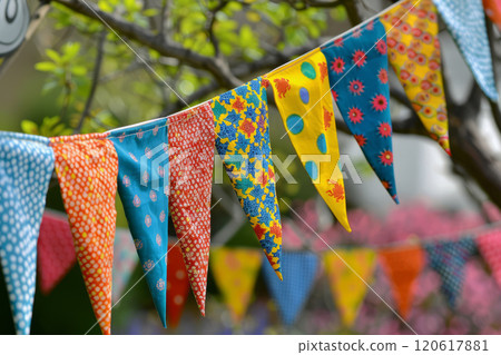 Colorful triangle flags, decorate for a festive celebration, with blurred background 120617881