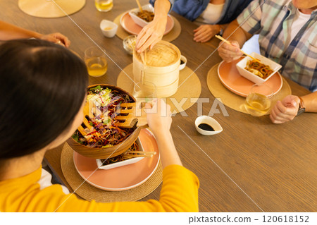 At home, Sharing Asian cuisine, asian family enjoying meal together at dining table 120618152